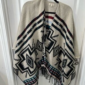 Woven Heart Cream Knit poncho with southwestern design